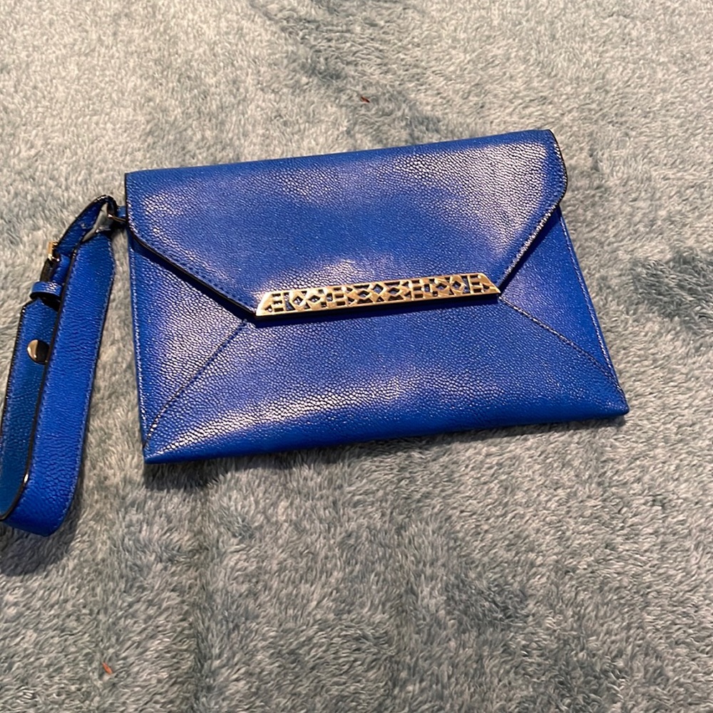Stella and Dot clutch with strap